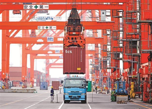 Japan’s economy shrinks, raising fears of recession