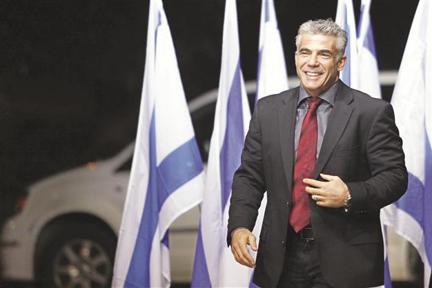 Israel’s new political star Lapid calls for new peace talks