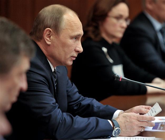 Russias Putin threatens to sack officials over social spending