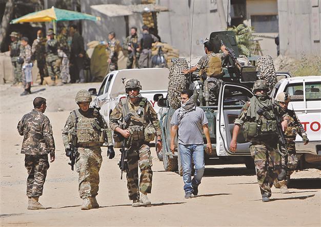 Afghan forces put down attack on HQs