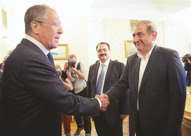 Russia urges sides in Syria to work together