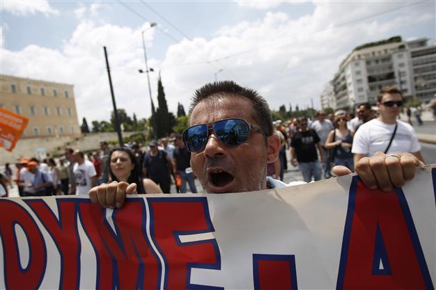 Greece nears deal for next tranche of EU-IMF funds