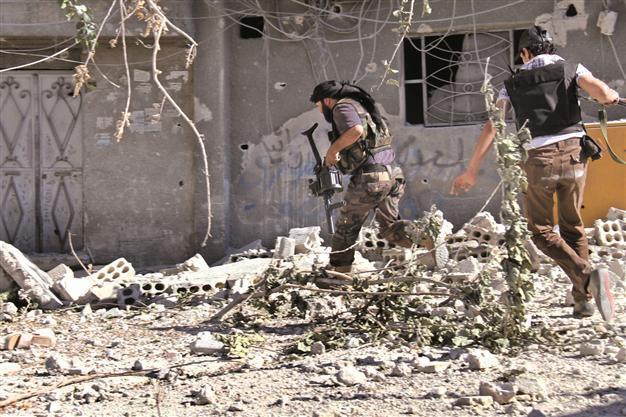 Radicals tarnishing Syria revolt, says FM Davutoğlu