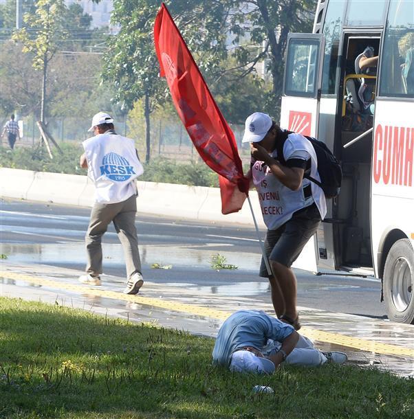Police intervene with water cannons and tear gas in union march in Ankara