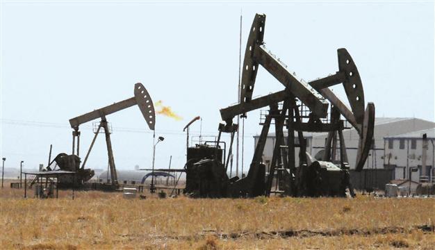 Oil hits six-month high, shares fall on Syria fears
