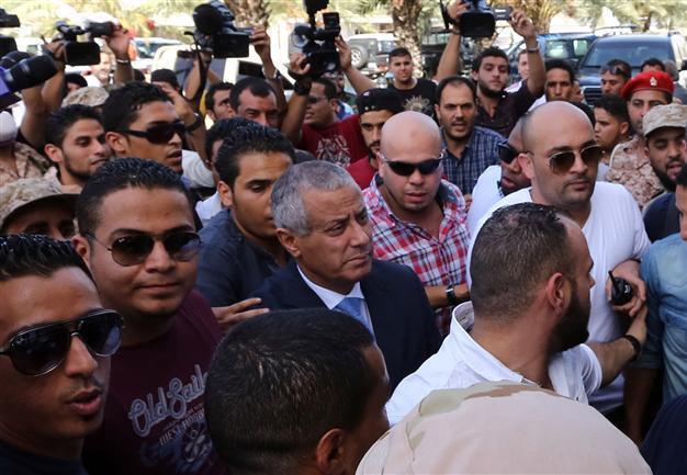 Freed Libyan PM arrives at government HQ