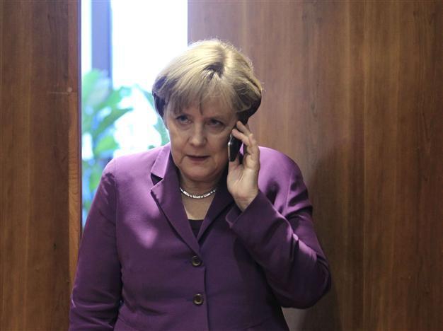 Germany summons US envoy over Merkel phone spy claims