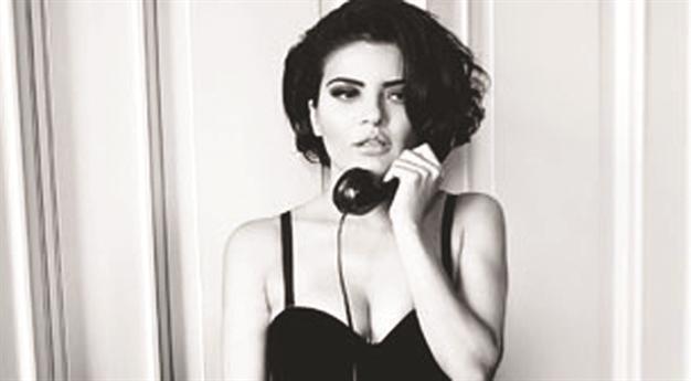 Göksel on stage at Jolly Joker