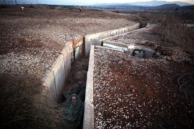 Israel says returns fire into Syria on occupied Golan Heights