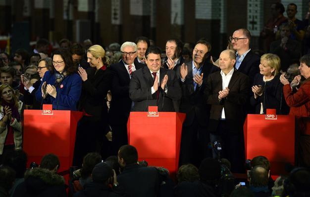 German SPD members approve grand coalition with Merkels conservatives