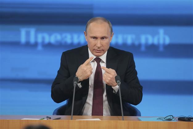 Putin says nuclear-capable missiles not yet put in Kaliningrad