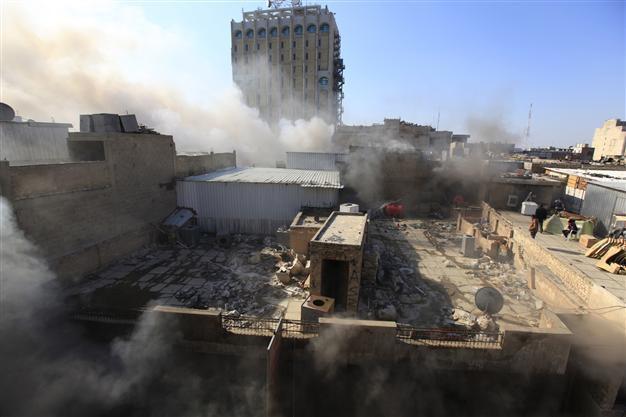 Baghdad bombs, one near foreign ministry, kill 24