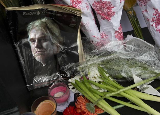 Four arrests in drug probe of Hoffman death: report