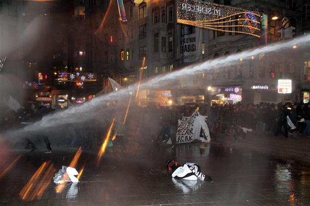 Police fire water cannon at group gathered to commemorate slain student in Taksim