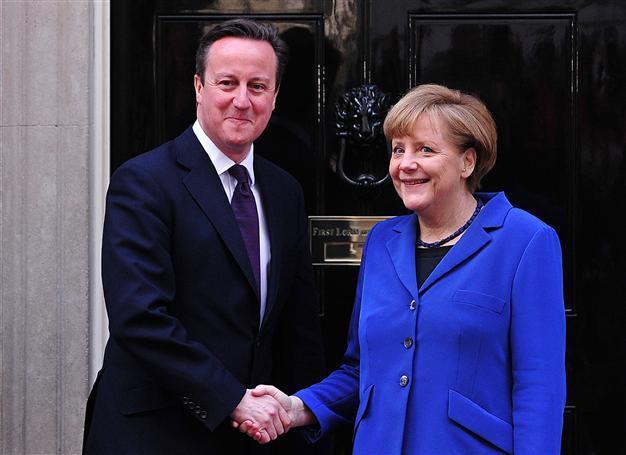 Merkel urges Britain to stay in EU but cool on reform