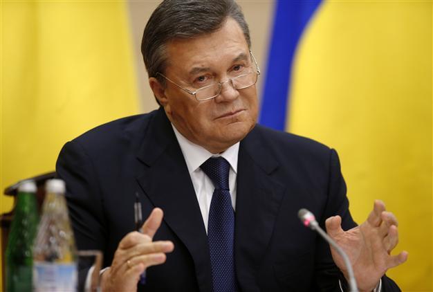 Yanukovych insists not overthrown, will fight on