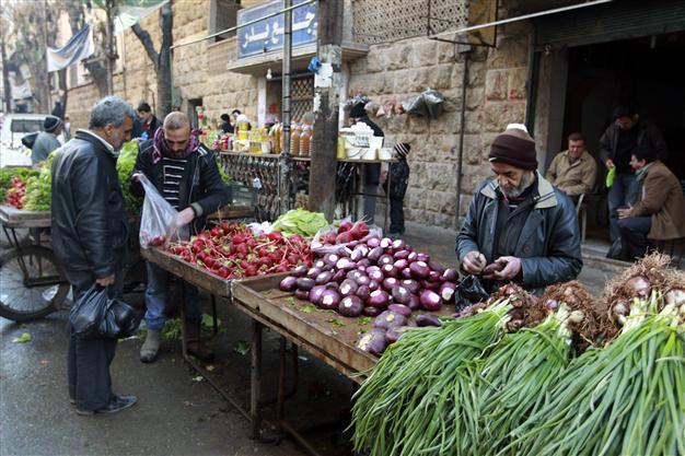 Truce in besieged Damascus suburb may bring food to starving residents