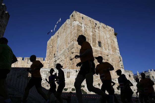 Palestinians protest Jerusalem marathon