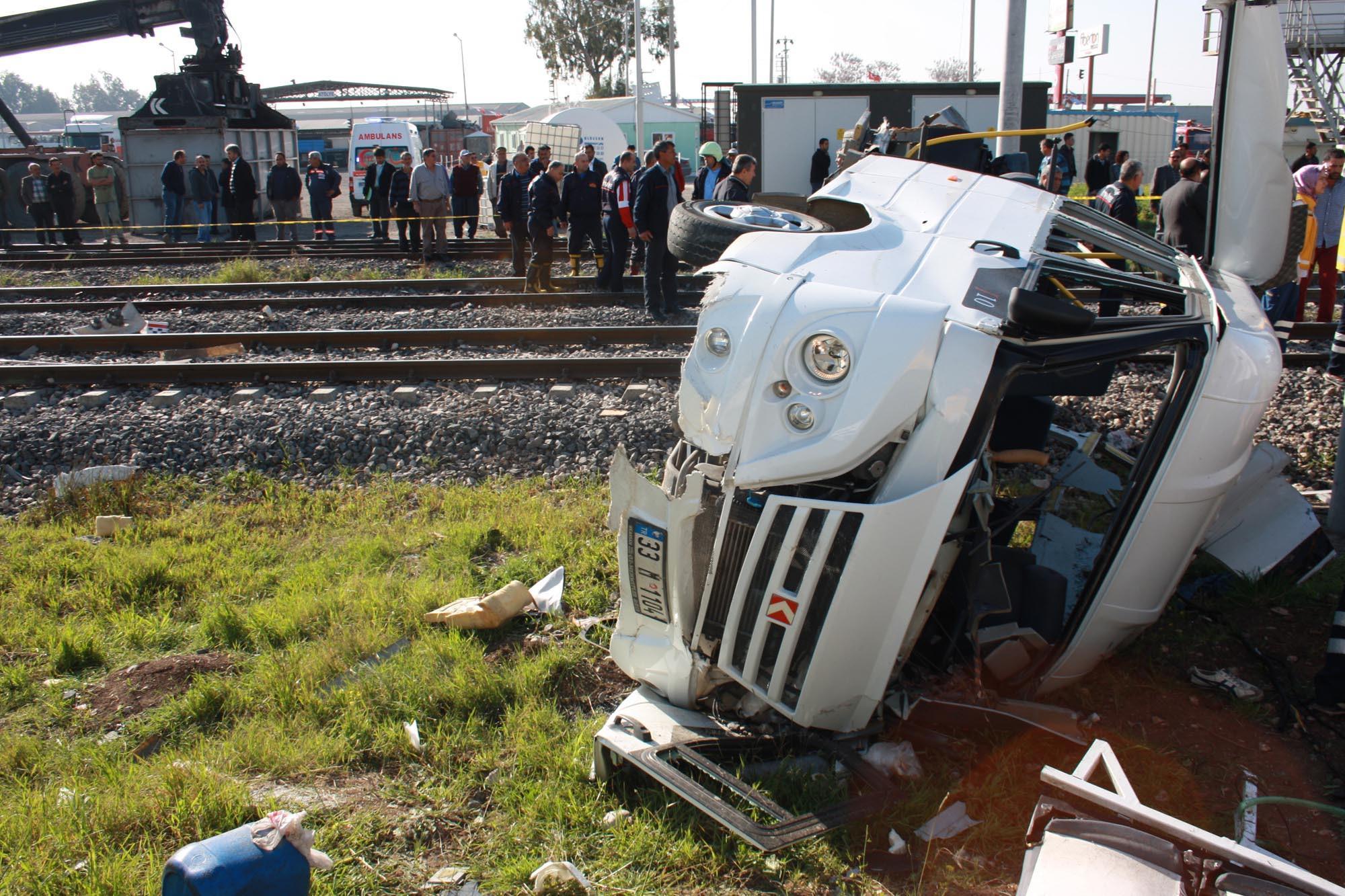 Ten killed as commuter train crashes into shuttle bus in southern Turkey