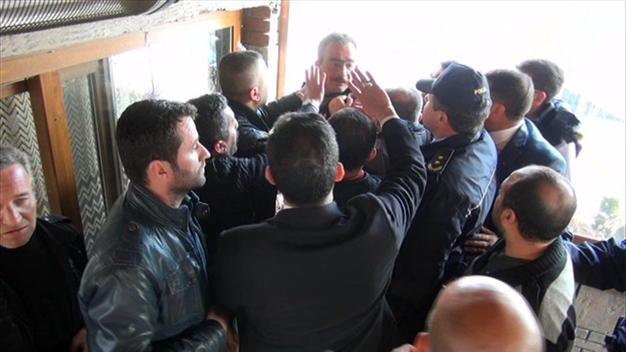 Man briefly detained for shouting ‘shoebox’ during event attended by Turkish interior minister