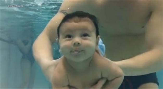 Video of adorable swimming babies