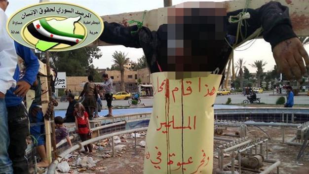 ISIL crucifies prisoners, bulldozes historic statue