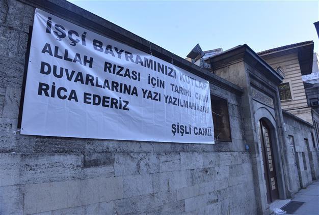 Istanbul mosque asks May Day protesters not to damage its walls with writings