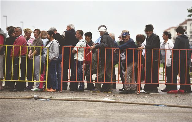 Debt-laden Serbia braces for painful reforms