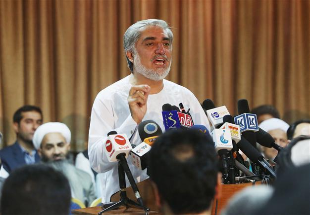 Abdullah claims victory in contested Afghan election