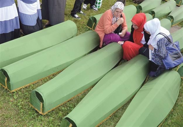 Bosnia marks anniversary of Srebrenica with mass burial
