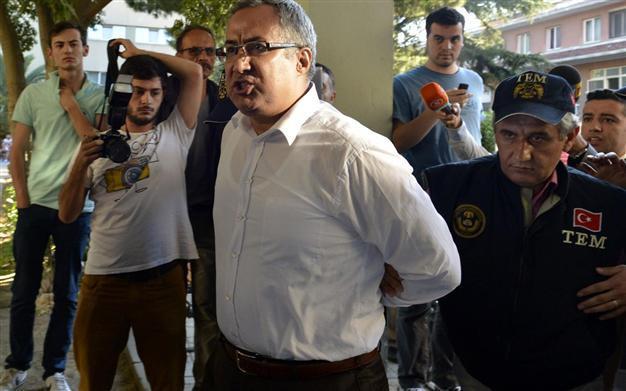 Eleven police officers arrested in wiretapping probe