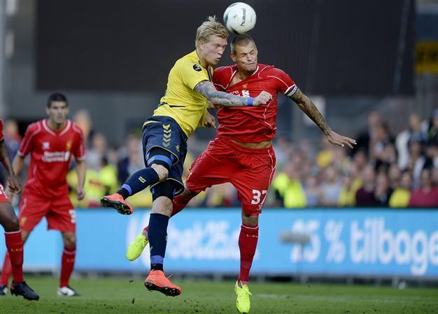 Liverpool start life after Suarez with defeat