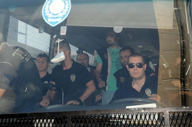 At least eight police officers arrested in wiretapping probe