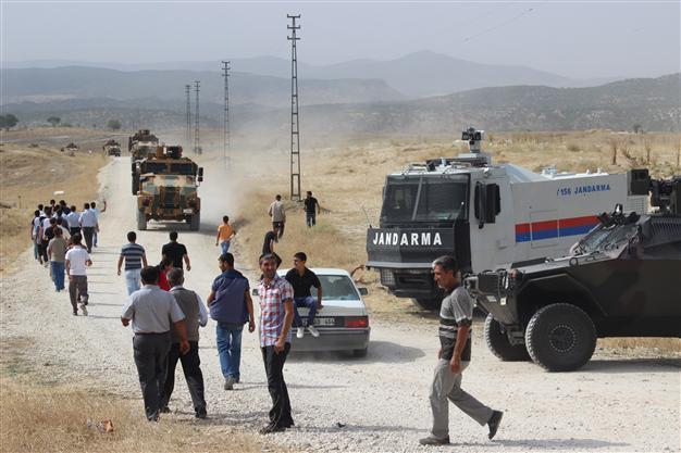 Soldier and protester killed in clashes during operation to remove statue of PKK founder