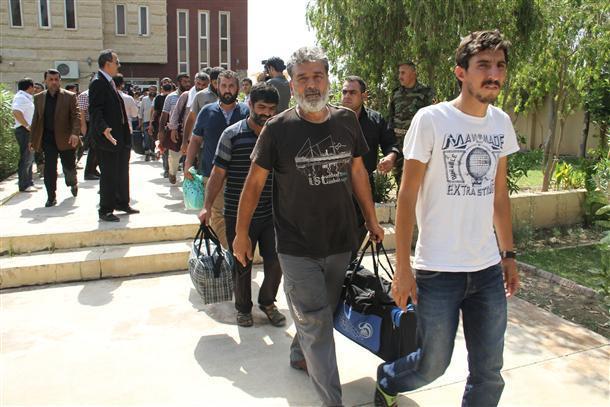 Turkish drivers return Turkey after 23 days in captivity as ISILs hostages