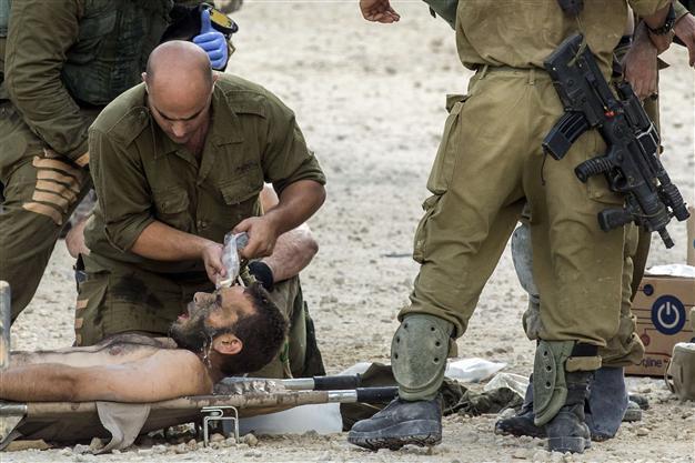 Israel army: 13 soldiers killed overnight in Gaza