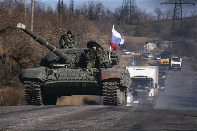 Ukraine accuses Russia of sending dozens of tanks