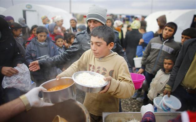 UN asks people to give $1 each for Syrian refugees to restore food vouchers