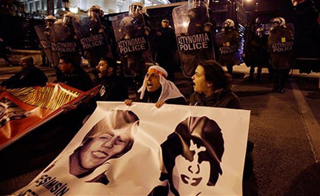 Greece bans protests amid Turkish PM’s visit as teen killed by police commemorated