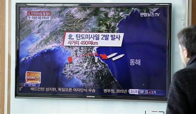 North Korea, angered by drills, fires short-range missiles off coast