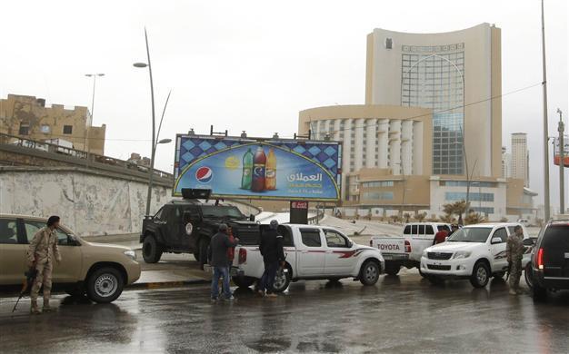 At least eight dead as gunmen storm Tripoli hotel: Libyan official