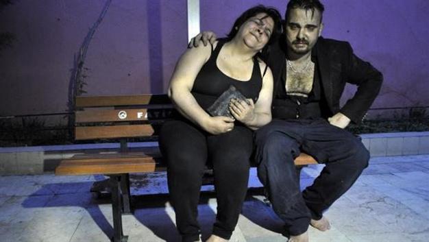 Turkish woman saves two cats from fire, cries for two others