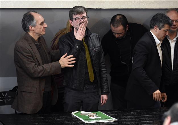French attack survivor Luz says he is leaving Charlie Hebdo