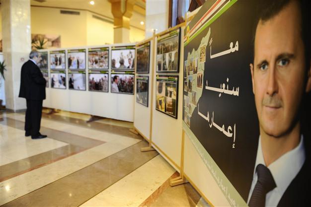 Syrias Assad says awaiting action after Kerry comments