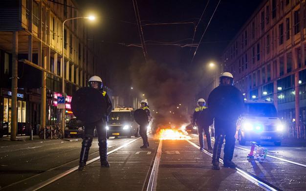 Hague police detain 200 as disturbances continue