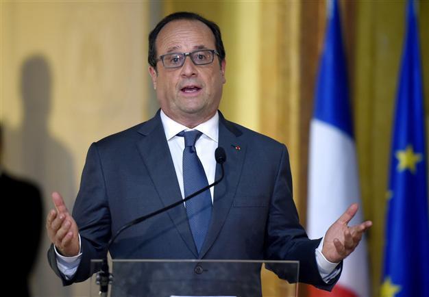 Hollande says will ask EU summit to work with Turkey on refugee crisis