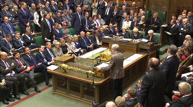 British PM, new opposition leader spar politely in parliament’s ritual joust