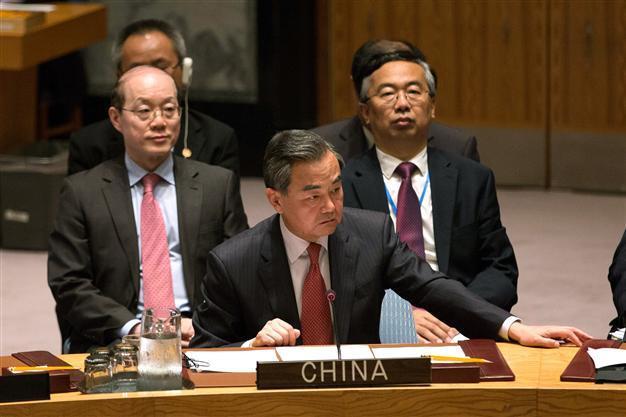 China says world should not arbitrarily interfere in Syria