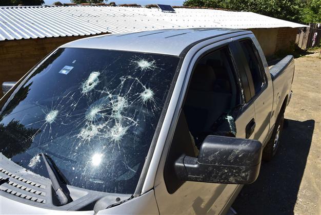 El Chapo manhunt leaves bullet-riddled homes, cars