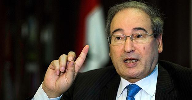 Top Syrian official rules out Assad departure